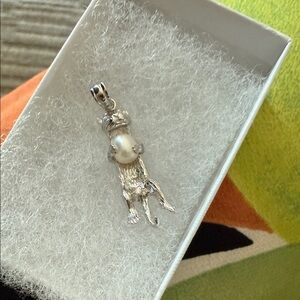 Sterling silver Otter holding a pearl pendant for necklace